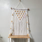 White large shelf with beads