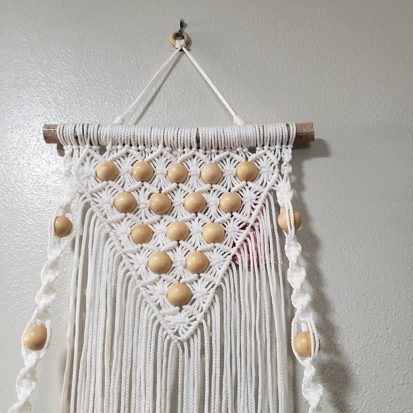 White large shelf with beads