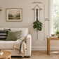 Black-and-white plant hanger beside a living-room window, with 32-inch length and 13-inch width labels