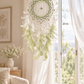 Dream catcher hanging from the ceiling in front of an open window, 13 x 23 inches