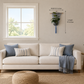 Wider living-room mockup with smaller slate blue plant hanger